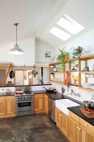 
Open shelves and skylights make for a bright and cheery kitchen.
